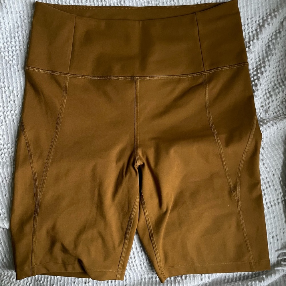 Girlfriend Collective High Rise Bike Shorts in Saddle